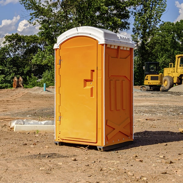 how often are the portable restrooms cleaned and serviced during a rental period in Woodland Maine